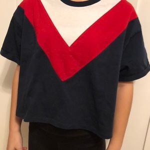 a short sleeve shirt red white and navy blue.